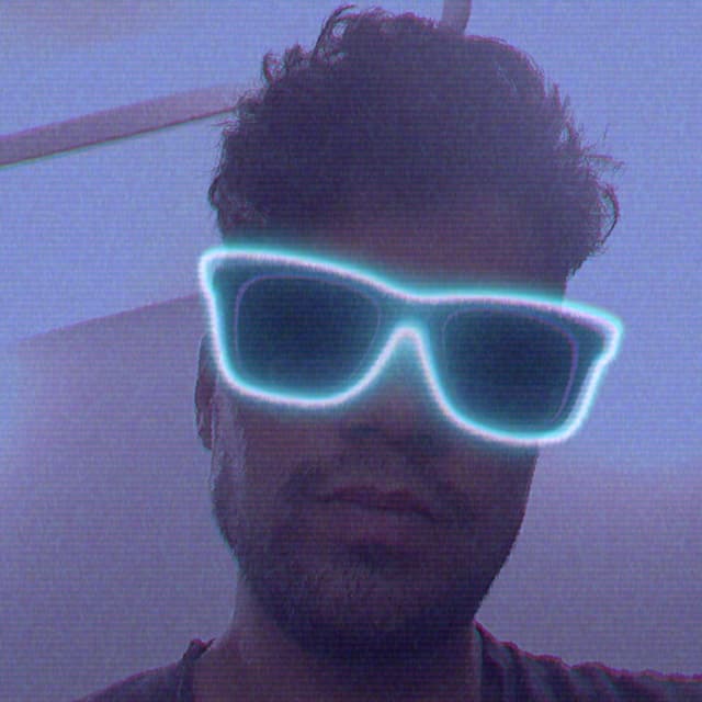 Saaim wearing neon glasses